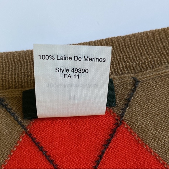 J Crew
Women’s 
Wool 
Medium 
V-Neck Argyle Sweater
Tan and Orange 
EUC - Picture 10 of 11